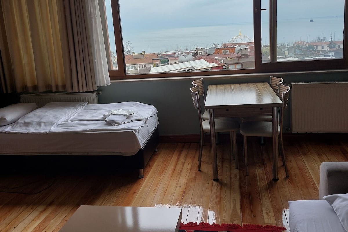 Suite, 1 Bedroom, Kitchenette, Sea View | 1 bedroom, premium bedding, minibar, desk
