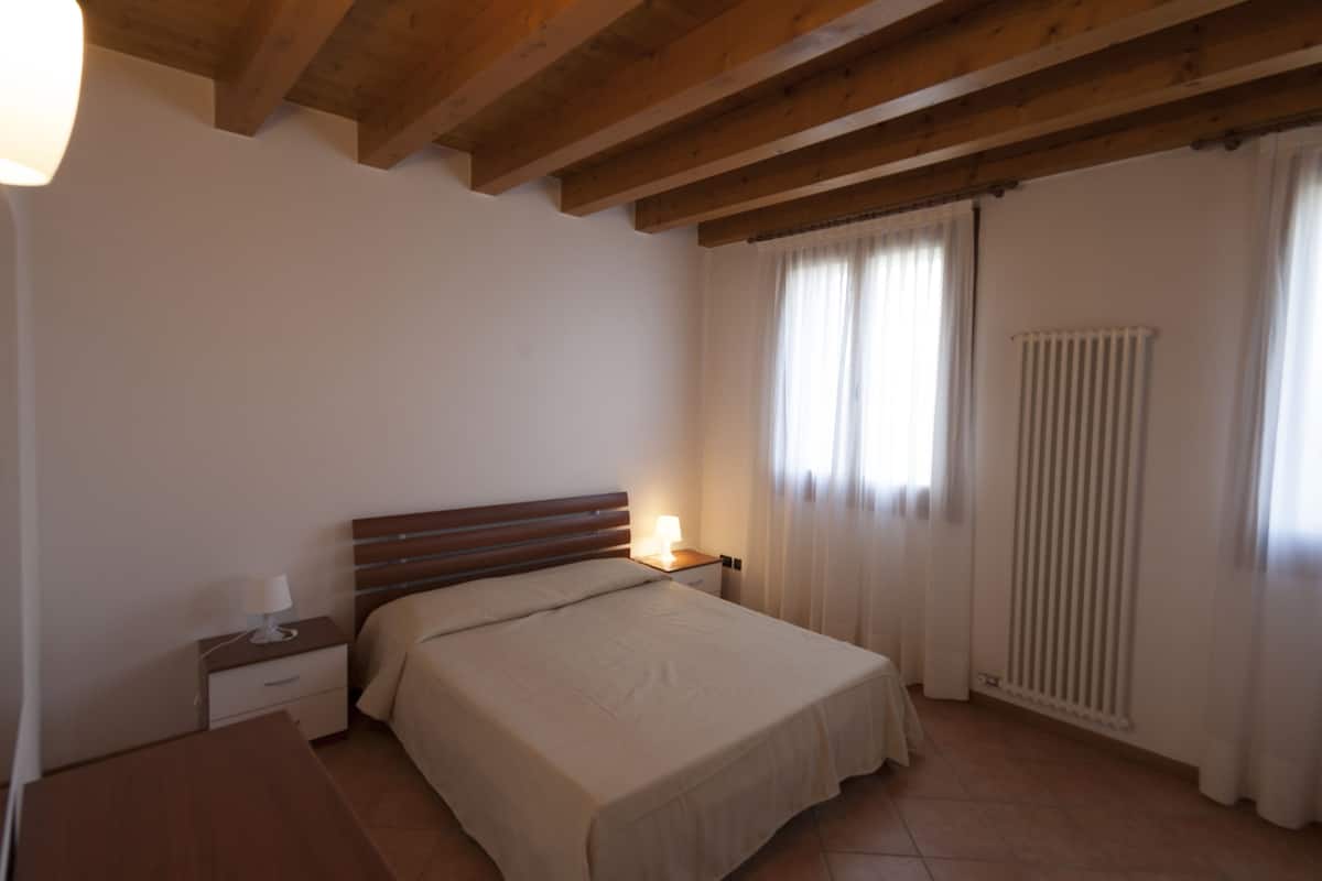 Comfort Room, 2 Bedrooms, Garden View (Quadrupla - 4 single beds) | Desk, WiFi (free), bed sheets