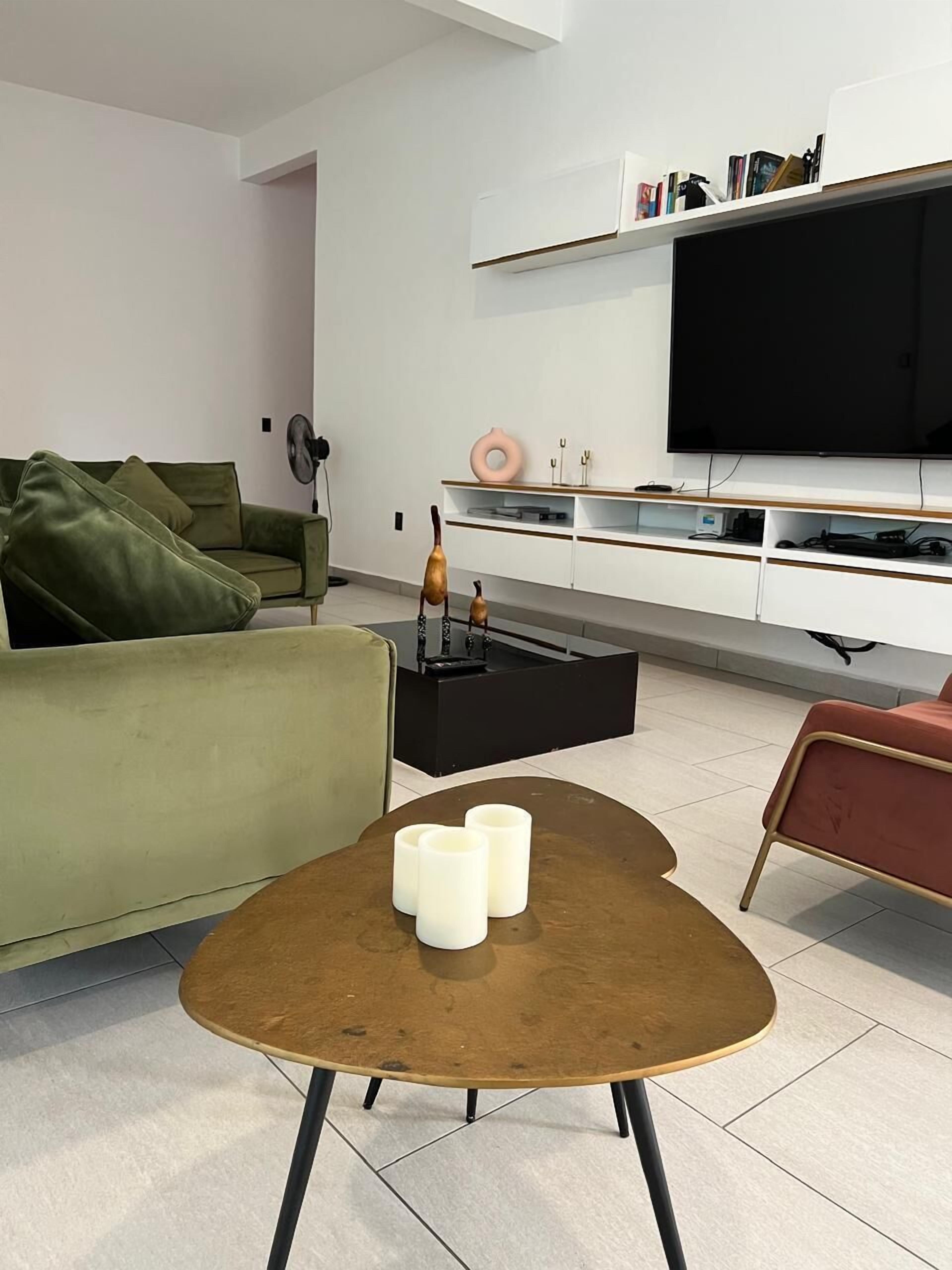 family apartment | living area | 28-inch flat-screen tv with satellite channels, tv