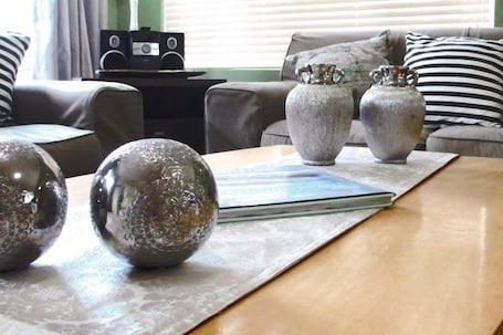 Self-Catering House | Living room | Flat-screen TV, fireplace, books, stereo