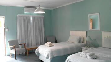 Budget rooms with 2 single beds | Free WiFi, bed sheets