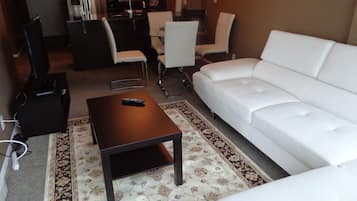50-inch flat-screen TV with cable channels, TV