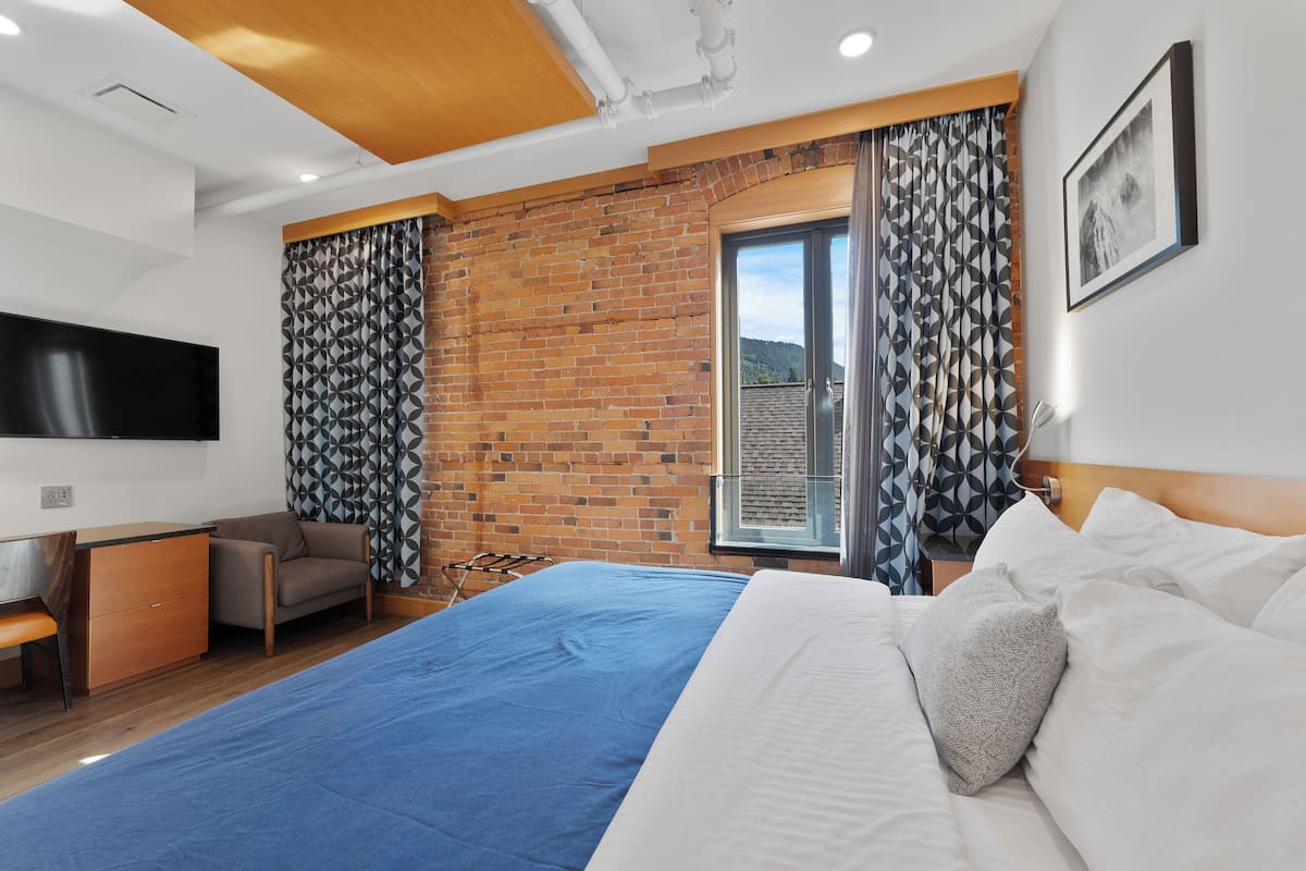 Chambre Deluxe, 1 trĂšs grand lit