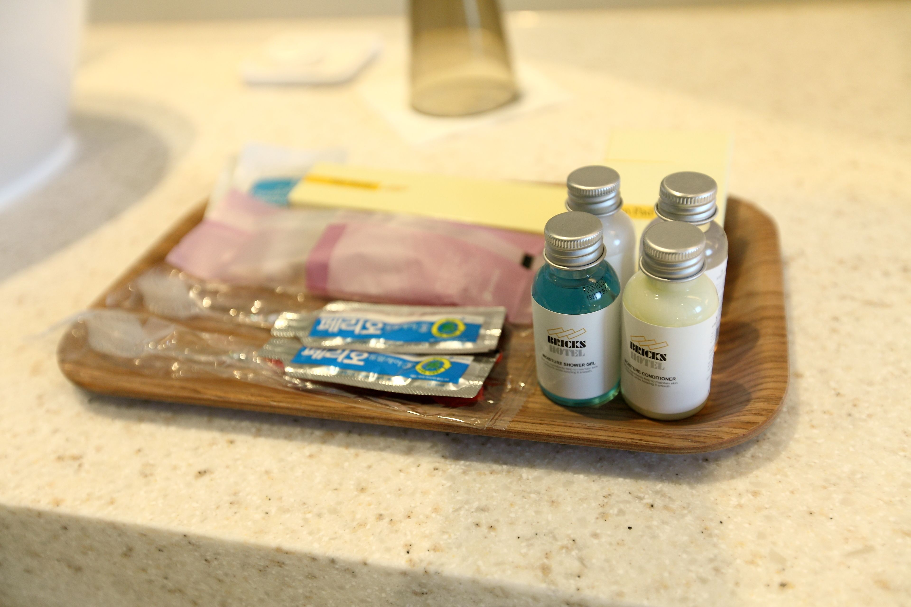 designer toiletries, hair dryer, dressing gowns, slippers