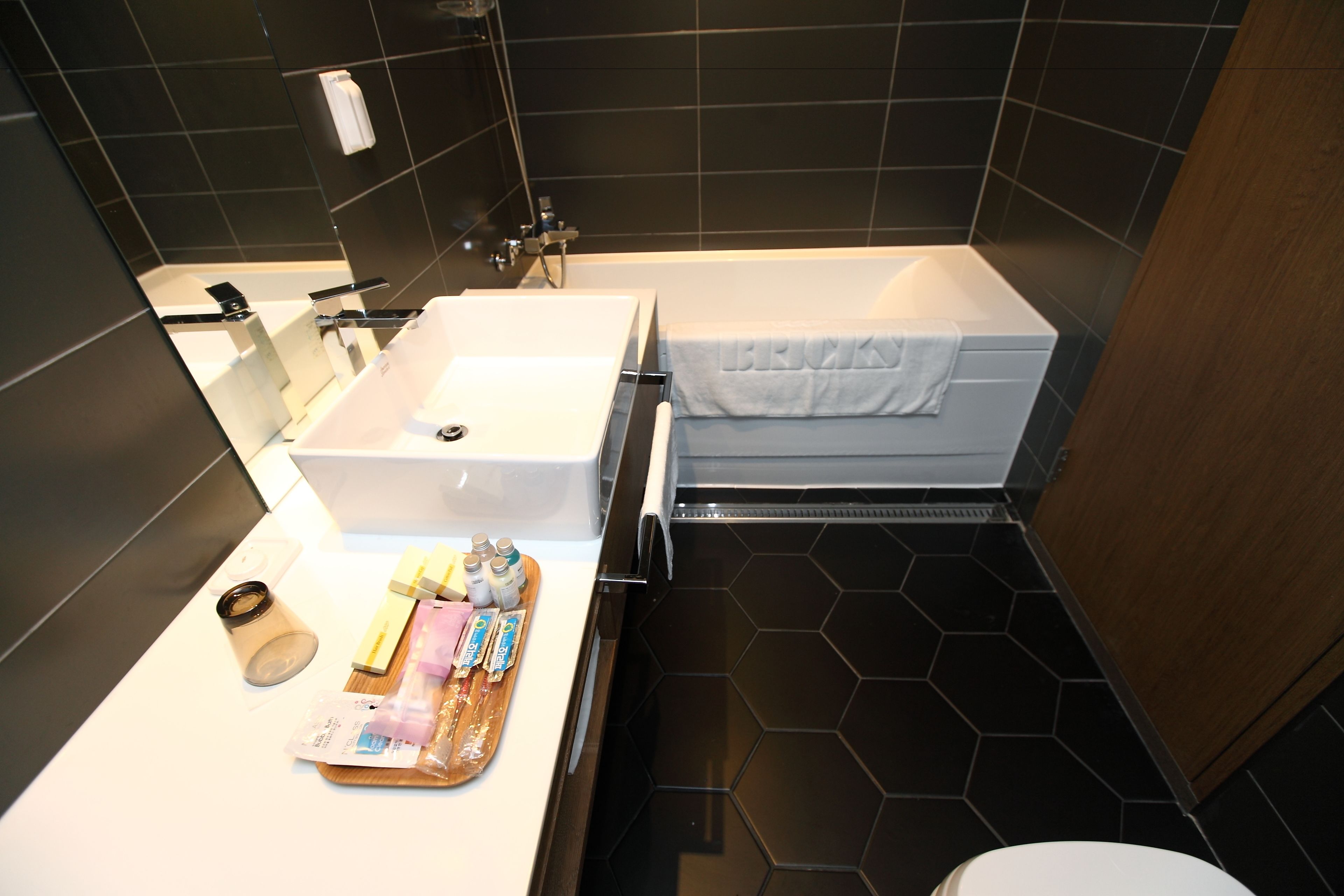 deluxe double room | bathroom | designer toiletries, hair dryer, dressing gowns, slippers