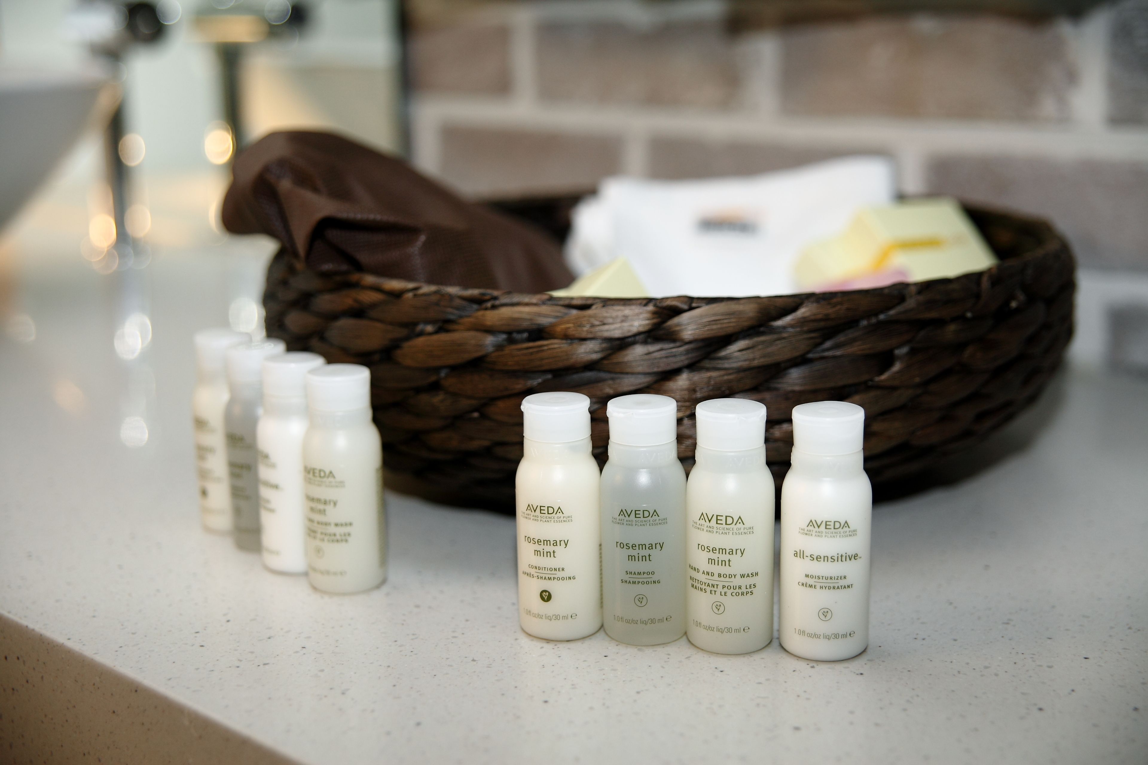 designer toiletries, hair dryer, dressing gowns, slippers