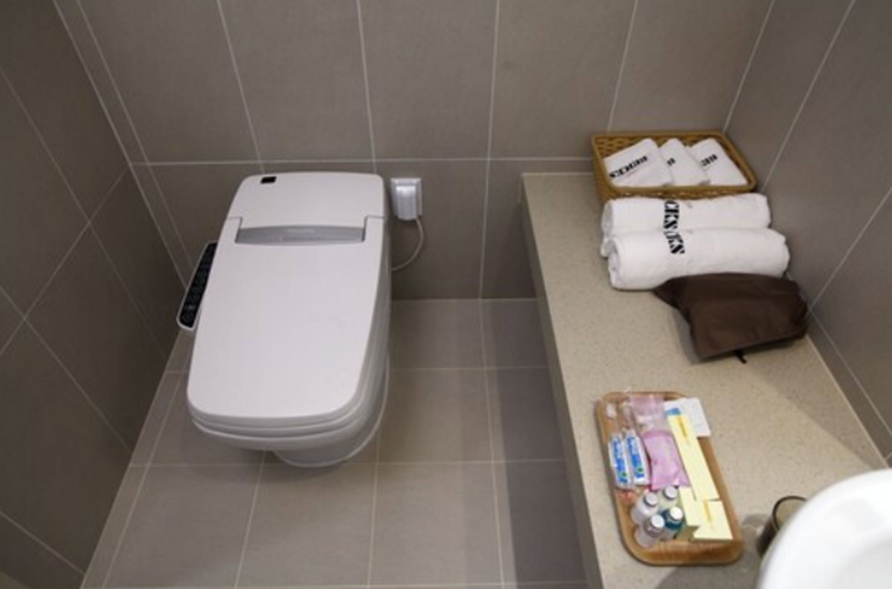 deluxe twin room | bathroom | designer toiletries, hair dryer, dressing gowns, slippers