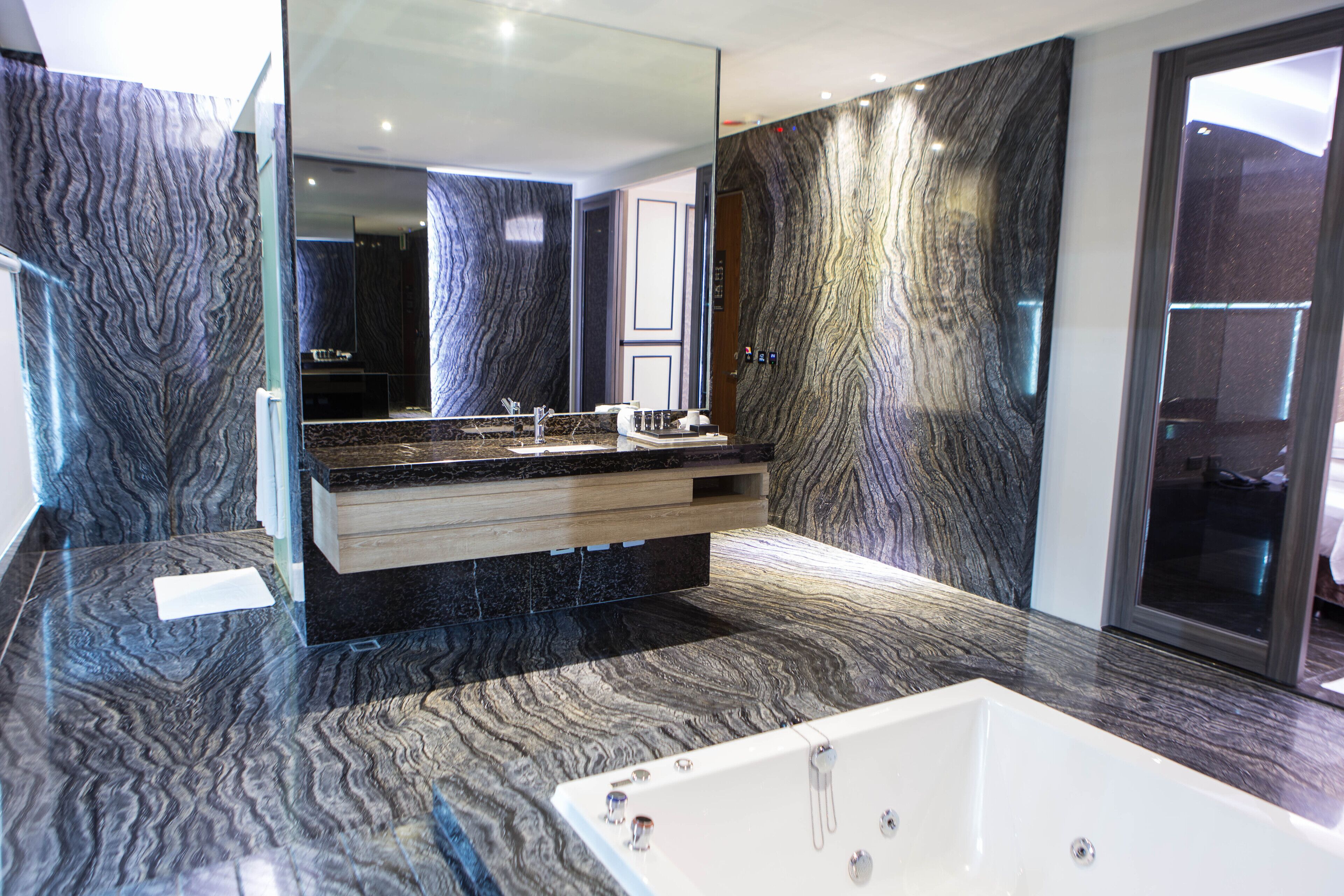 platinum suite (check in time starts from 6pm) | bathroom | separate bathtub and shower, free toiletries, hair dryer, slippers