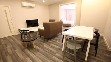 Deluxe Suite | Living room | LCD TV