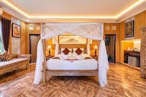 A spacious bedroom with a canopy bed, wooden paneling, and a marble floor. - Ashanti Villa Ubud (Ubud)