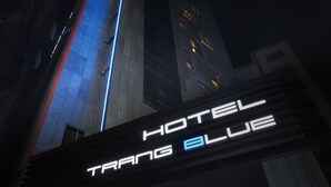 A hotel entrance with a sign reading "HOTEL TRANSG BLUE". - Trang BLUE (Seoul)