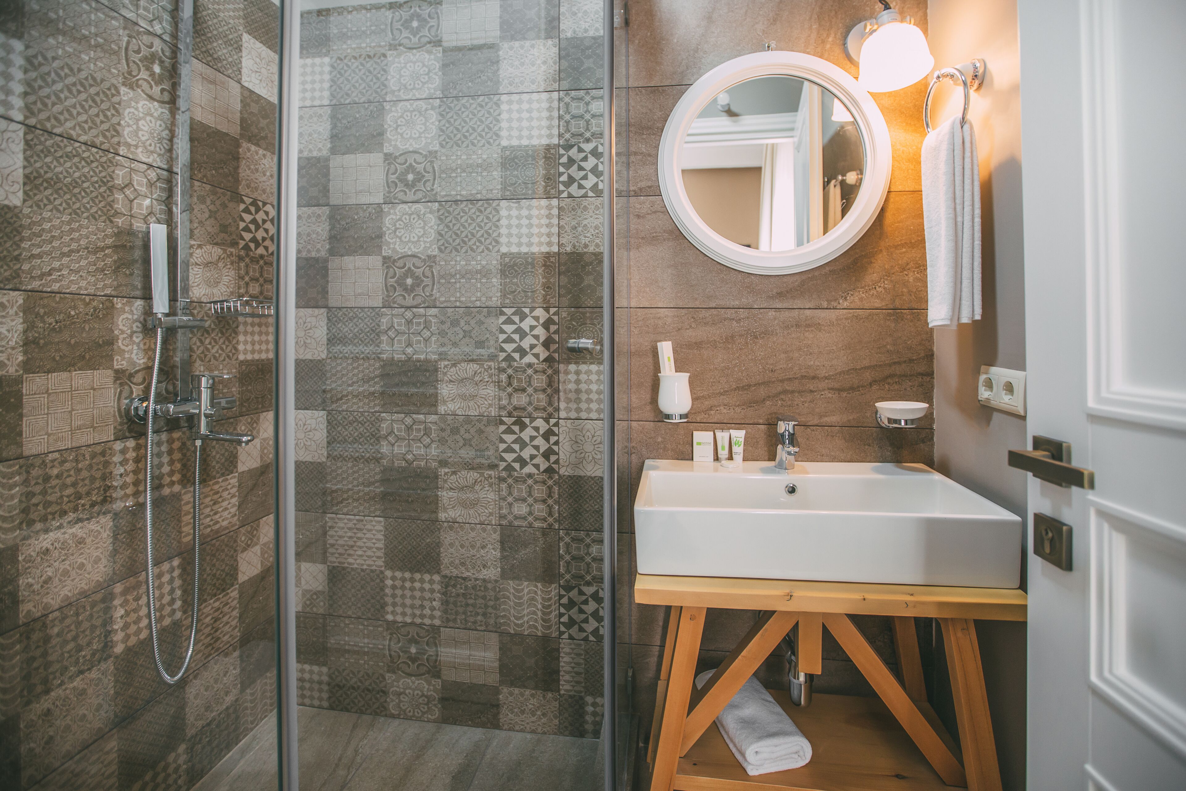 compact double or twin room, no windows | bathroom | shower, free toiletries, slippers, towels