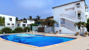 2 outdoor pools, pool umbrellas, pool loungers