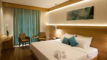 Premium bedding, desk, laptop workspace, soundproofing