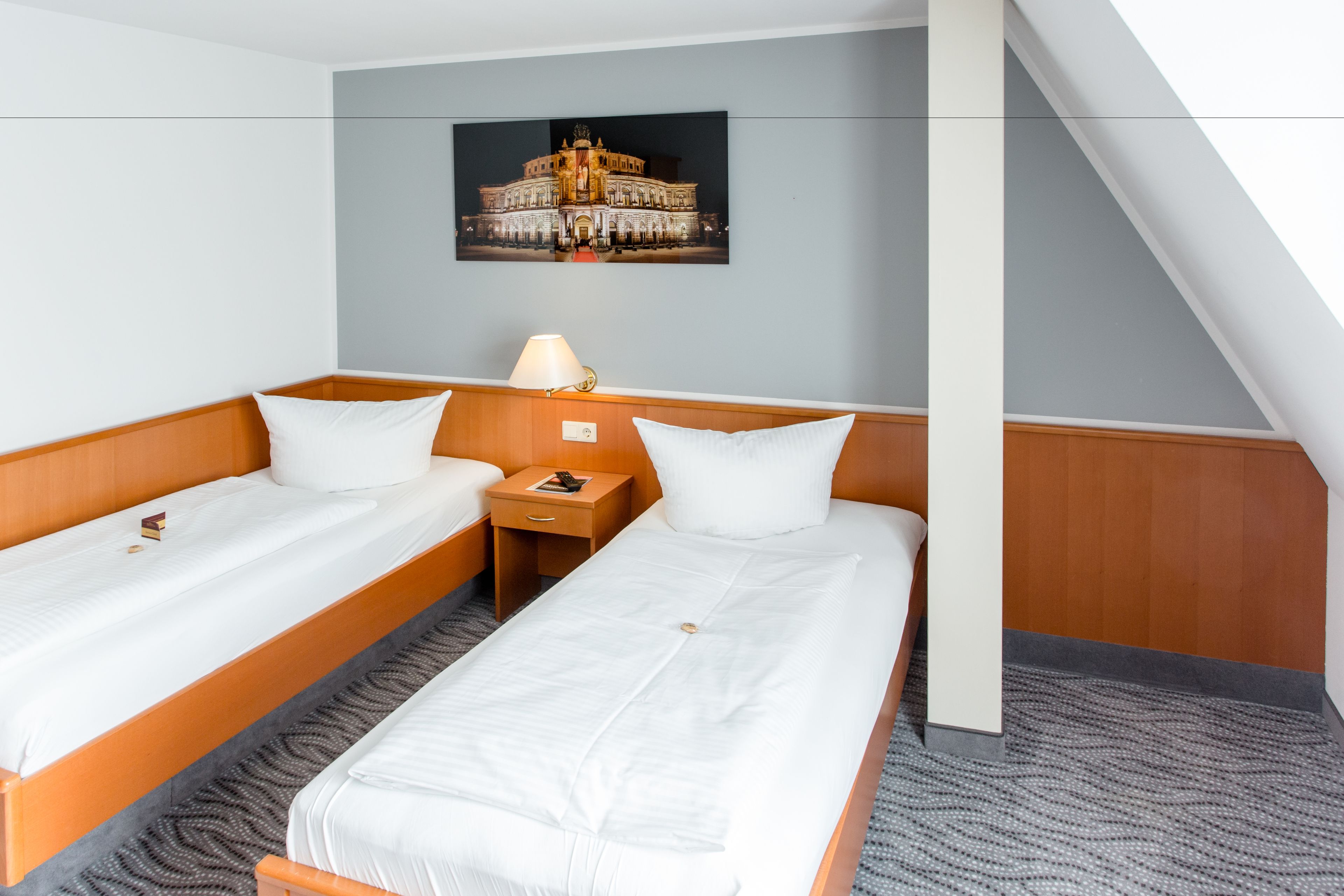 standard double room single use | living area | flat-screen tv