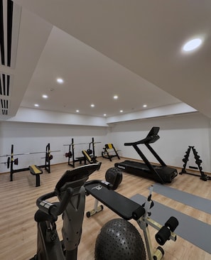 Stay fit and active in this well-equipped gym with treadmills, weight machines, and stationary bikes.