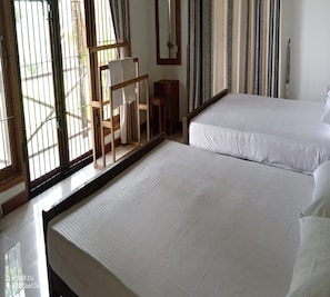 Family Quadruple Room, Balcony | Laptop workspace, soundproofing, bed sheets