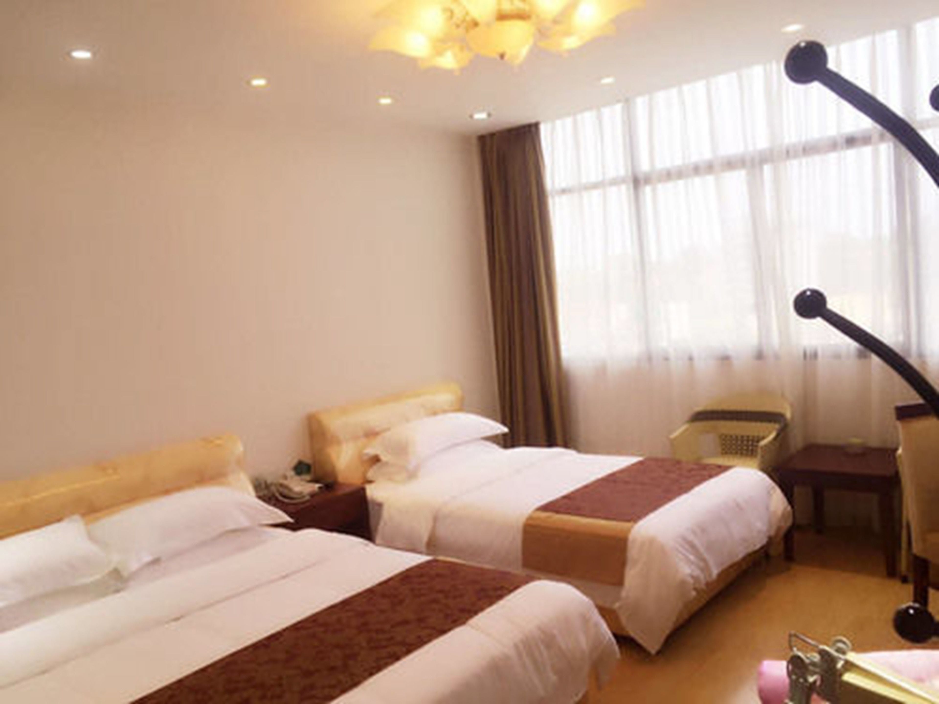 deluxe family room | minibar, in-room safe, desk, blackout curtains