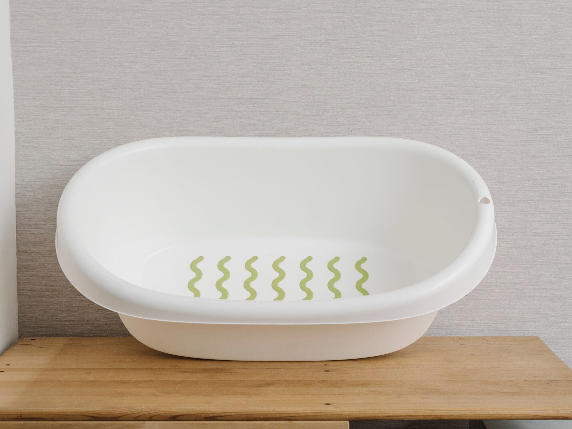 shower, hair dryer, slippers, towels