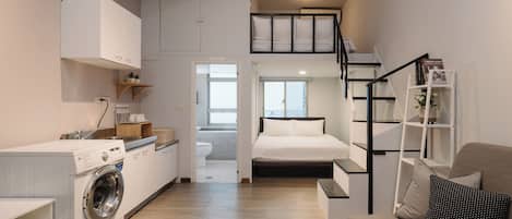 Signature Twin Room, 2 Double Beds | Living area | 32-inch LED TV with cable channels, TV