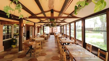Lunch, dinner served; local cuisine, garden views