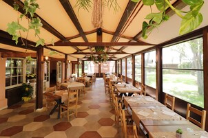 Lunch, dinner served; local cuisine, garden views 