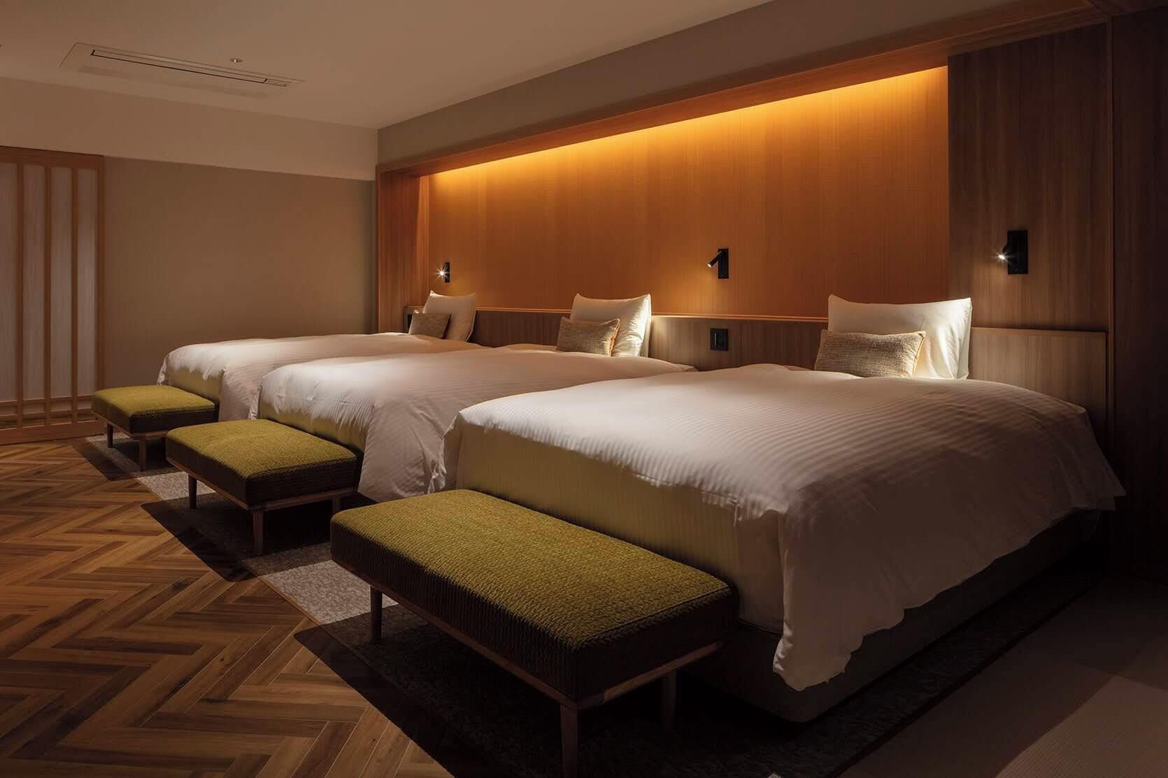 Chambre Triple Luxe, plusieurs lits, vue océan, côté jardin