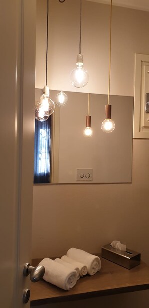 Superior Double Room, Ground Floor (2 Bosco) | Bathroom amenities | Shower, eco-friendly toiletries, hair dryer, slippers