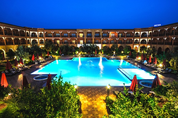 Indoor pool, outdoor pool, pool umbrellas, sun loungers