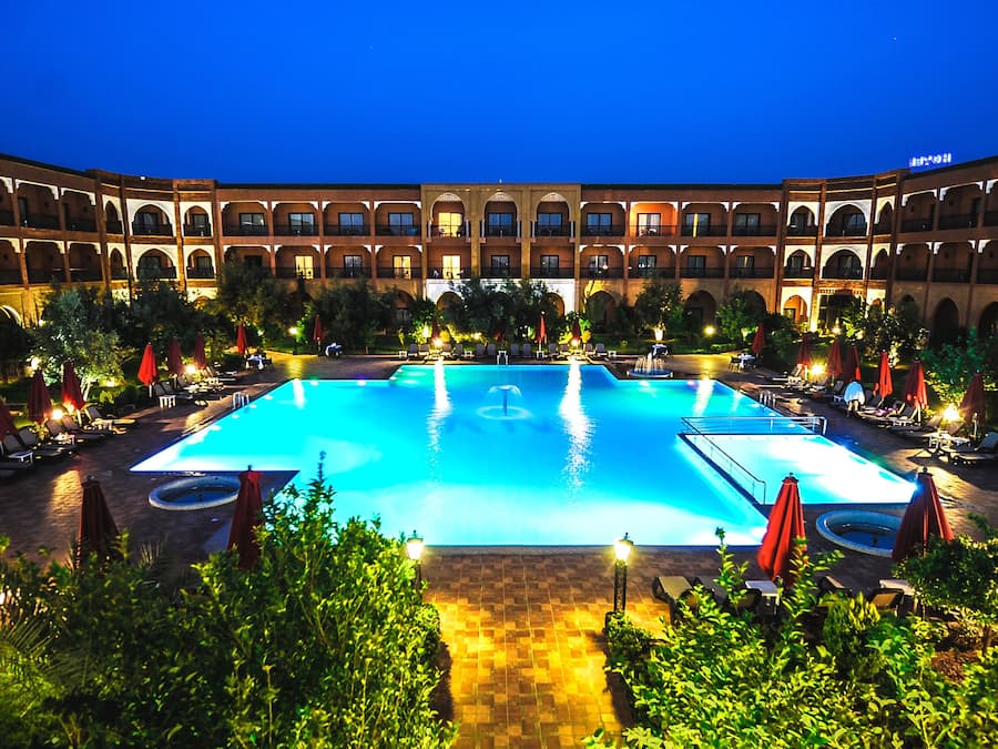 Indoor pool, outdoor pool, pool umbrellas, sun loungers