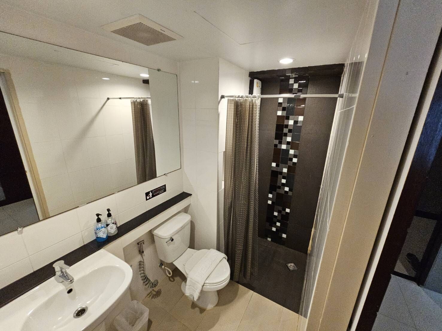 deluxe room | bathroom | shower, free toiletries, towels, soap