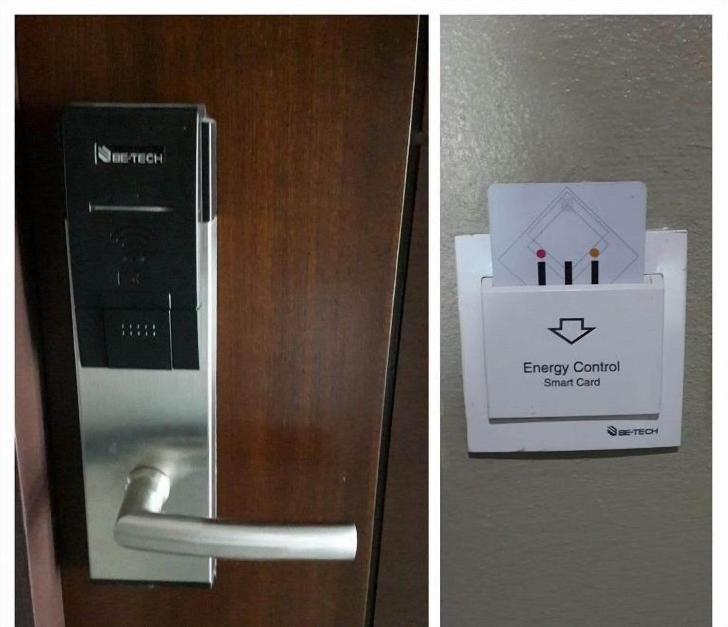 A door with a biometric fingerprint scanner and a card reader for an energy control smart card.