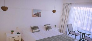 Habitación Vista al Mar | Roupas de cama premium, edredons de pluma, individualmente mobiliados
