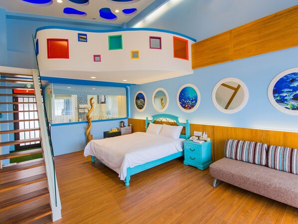 A bedroom with a bed, a nightstand, a sofa, a wooden staircase, and a wall with mirrors and artwork. - Star of Bethlehem BnB (Wujie)