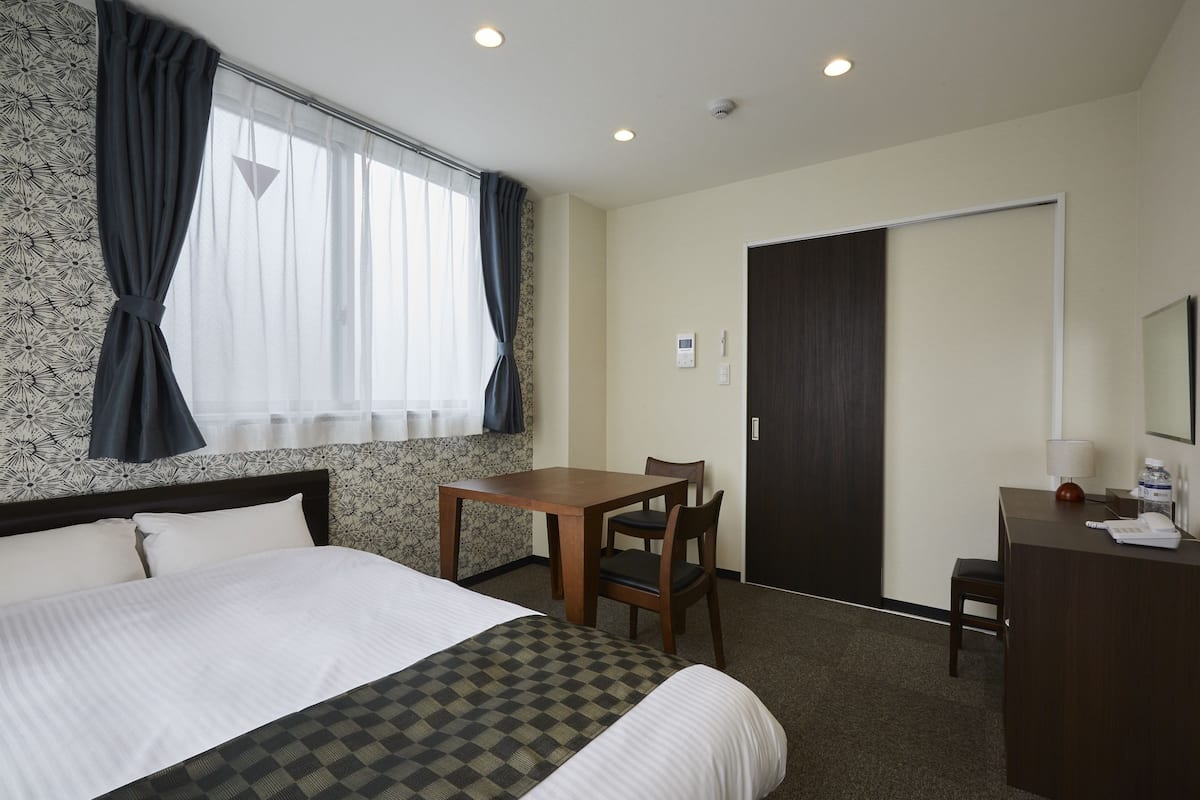 Double Room, Non Smoking (22sqm) | In-room safe, desk, WiFi (free), bed sheets