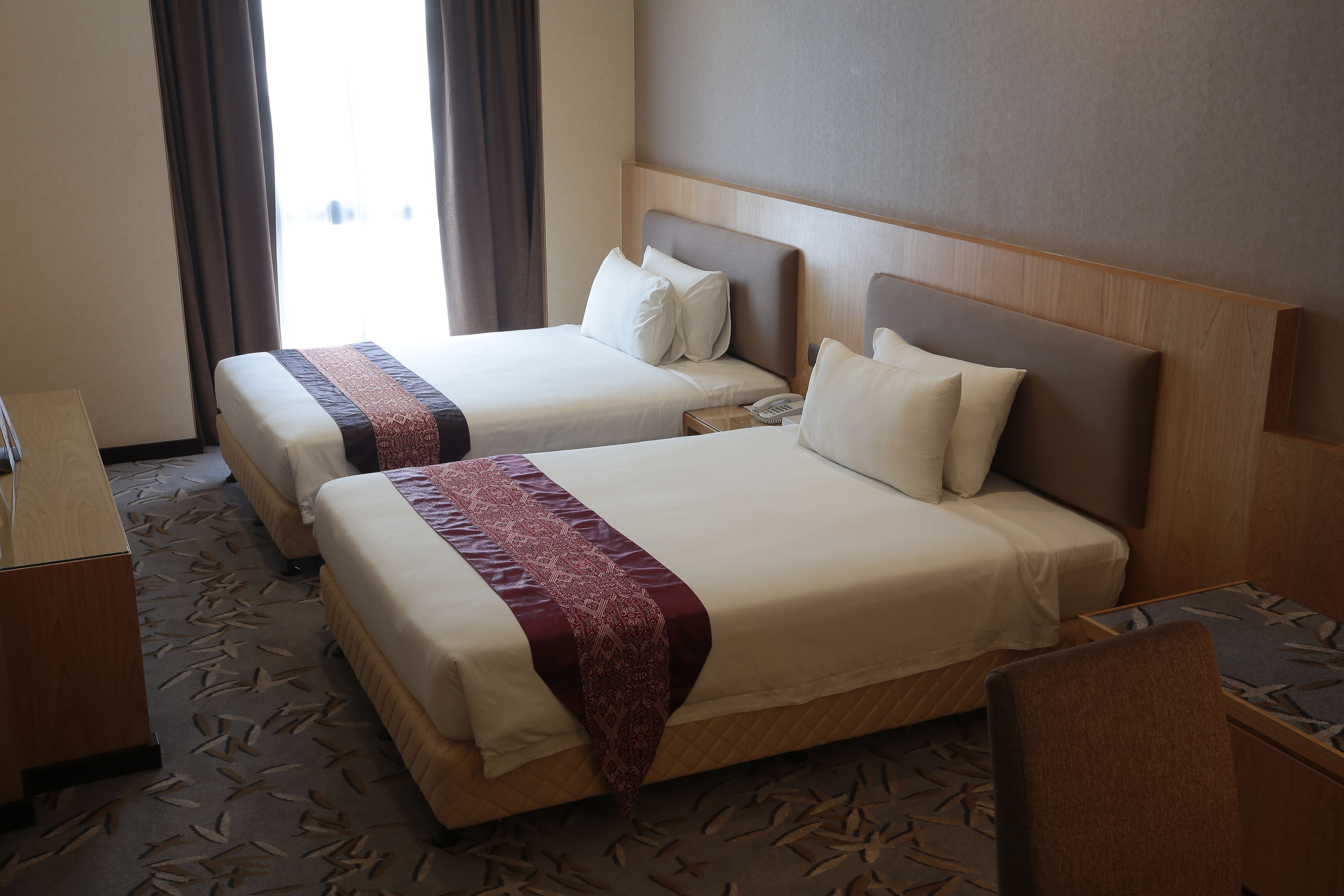 deluxe twin room | in-room safe, desk, iron/ironing board, free wifi