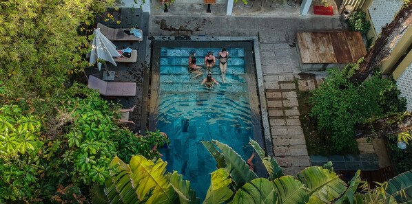 Outdoor pool, pool umbrellas, sun loungers