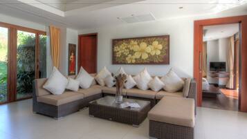 Deluxe Villa, 1 King Bed, Private Pool, Partial Ocean View | Living area | 52-inch Smart TV with digital channels, TV