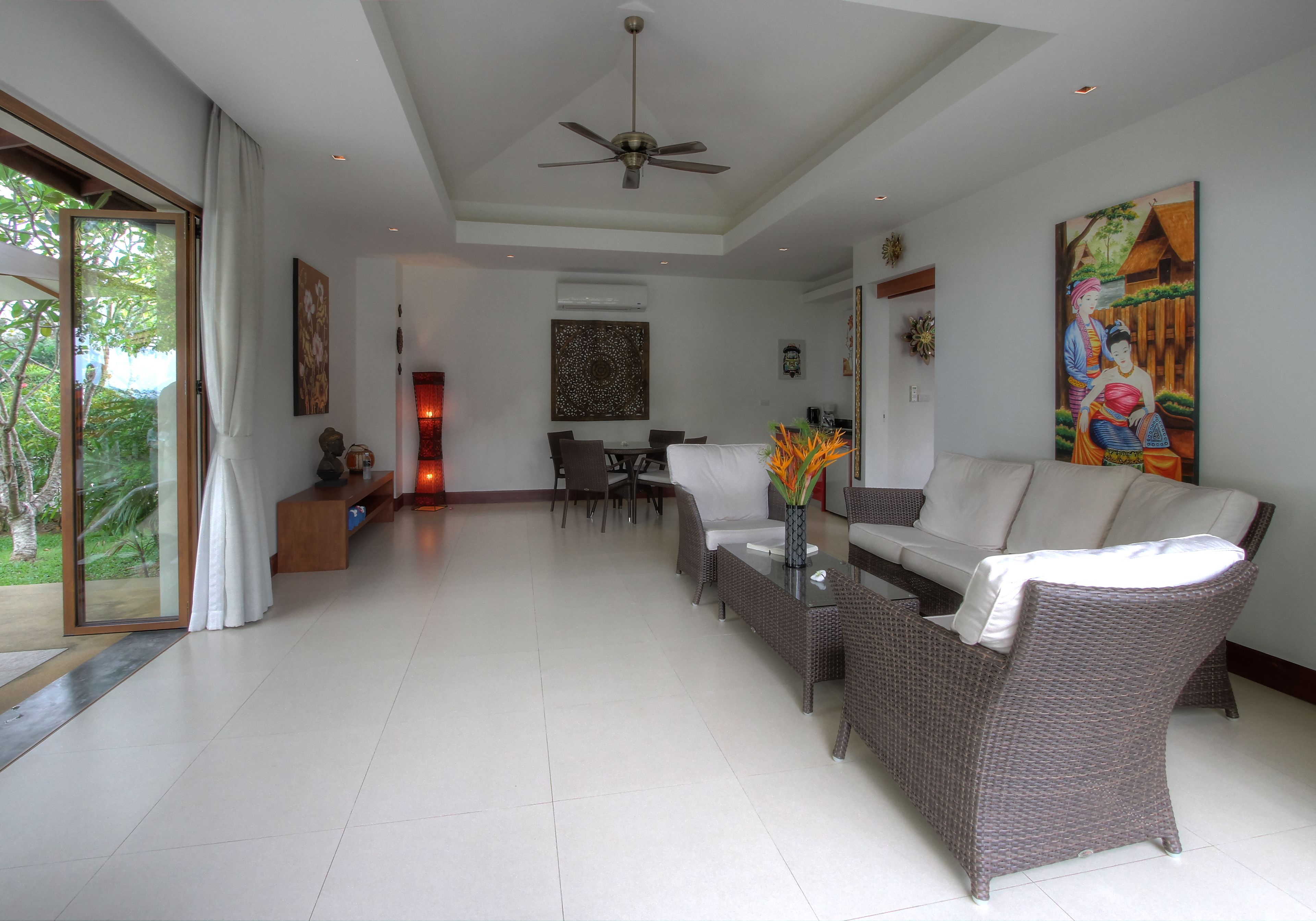 deluxe villa, 1 king bed, partial sea view | living room | 52-inch smart tv with digital channels, tv