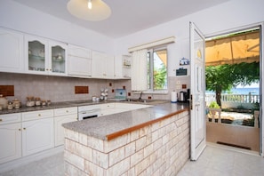 House , 2 Bedrooms, Sea View, with Garden (Melathron 3) | Private kitchen | Fridge, oven, stovetop, coffee/tea maker - Stegna Ilion (Rhodes)