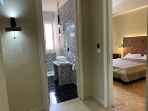 Family Room, 2 Bedrooms | Desk, iron/ironing board, free WiFi, bed sheets - L'Attico di Piazza Mazzini Rooms (Lecce)