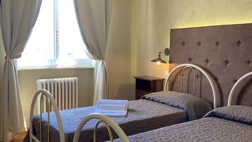 Family Room, 2 Bedrooms | Desk, iron/ironing board, free WiFi, bed sheets