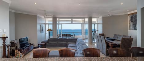 702 Oyster Rock - Self Catering | Living area | Flat-screen TV, DVD player