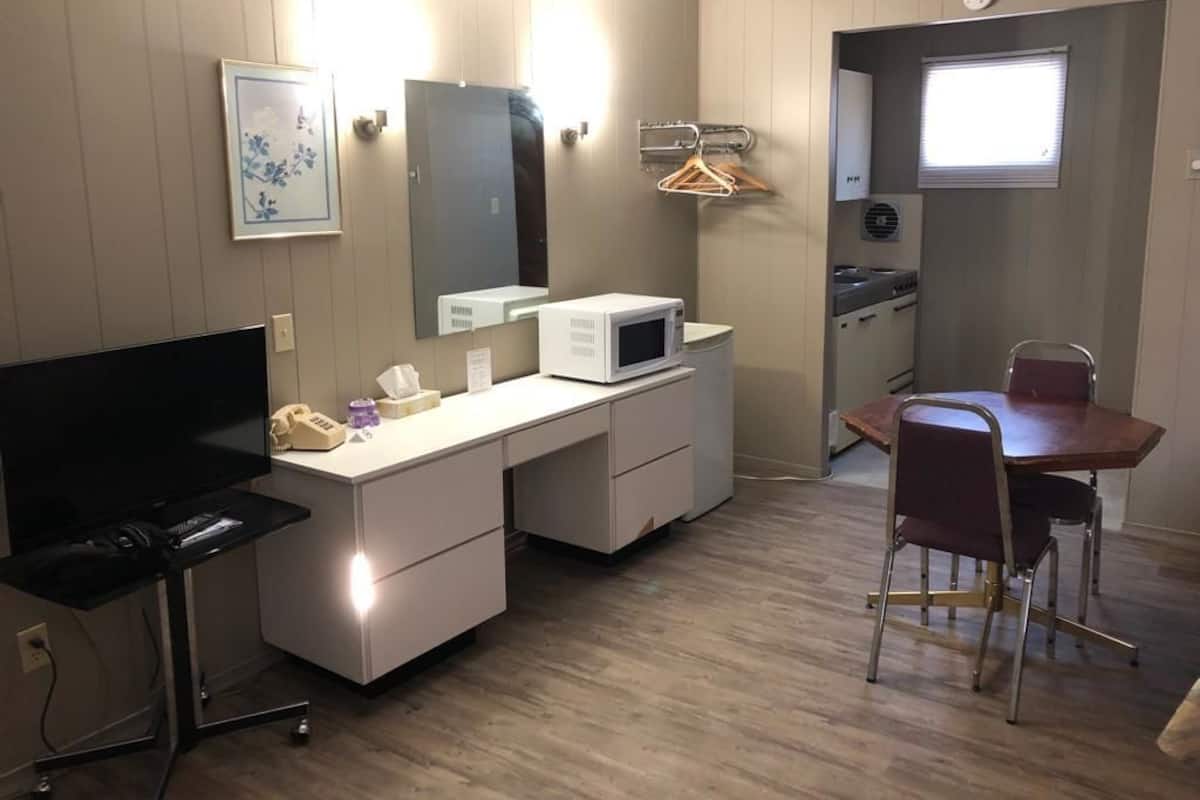 Double Room, 2 Queen Beds, Kitchenette | Individually furnished, desk, laptop workspace, blackout drapes