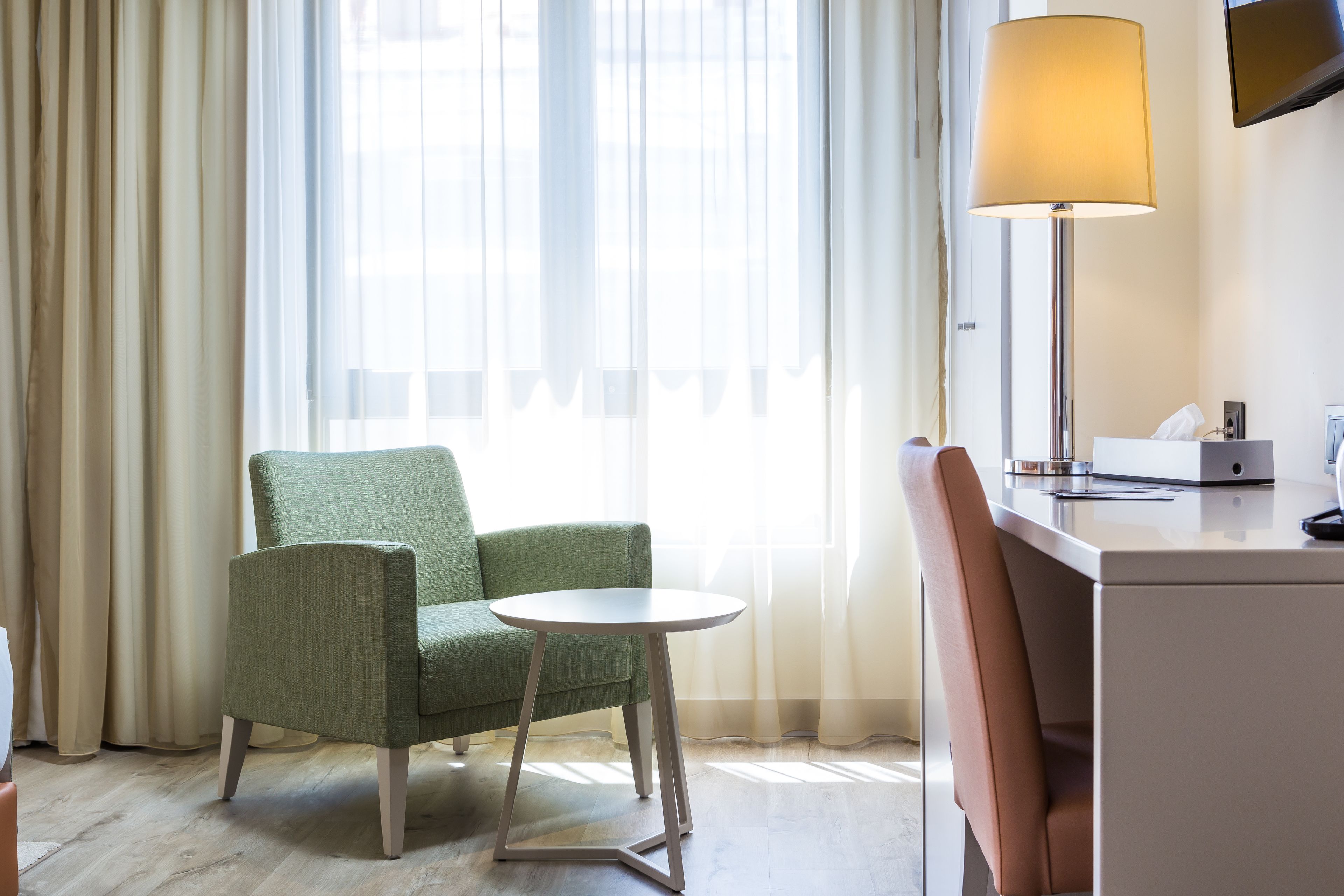 standard double room | in-room safe, individually decorated, desk, blackout curtains