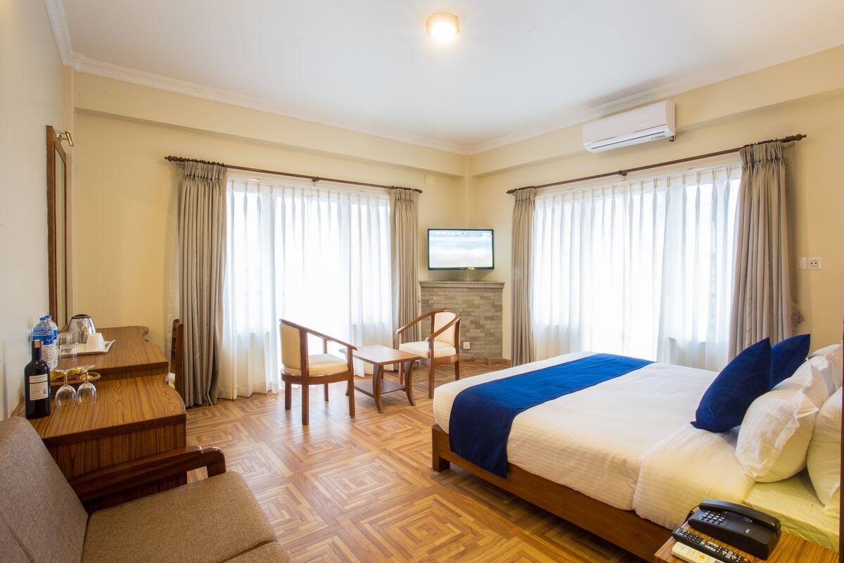 Quarto casal ou duplo exclusivo, 1 quarto, vista para o lago | Escrivaninha, ferros/tábuas de passar roupa