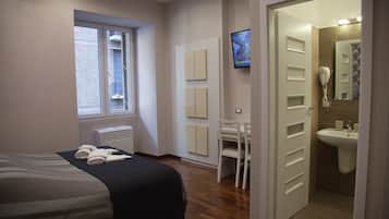 Chambre Deluxe Double ou avec lits jumeaux | Minibar, coffres-forts dans les chambres, bureau, rideaux occultants