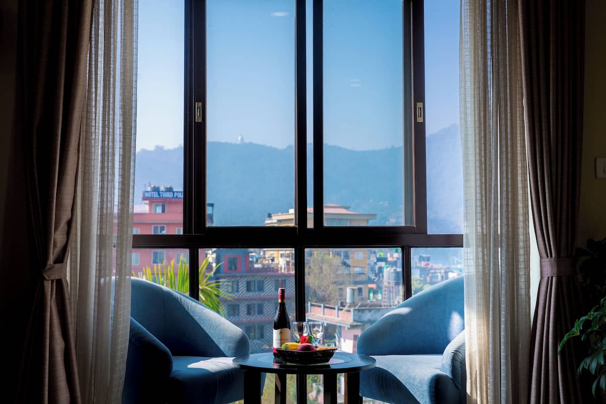 Deluxe Double or Twin Room | Minibar, soundproofing, iron/ironing board (on request), free WiFi