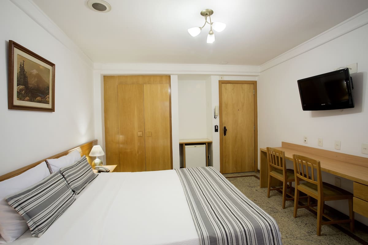 Standard Double Room Single Use | Minibar, in-room safe, individually decorated, desk