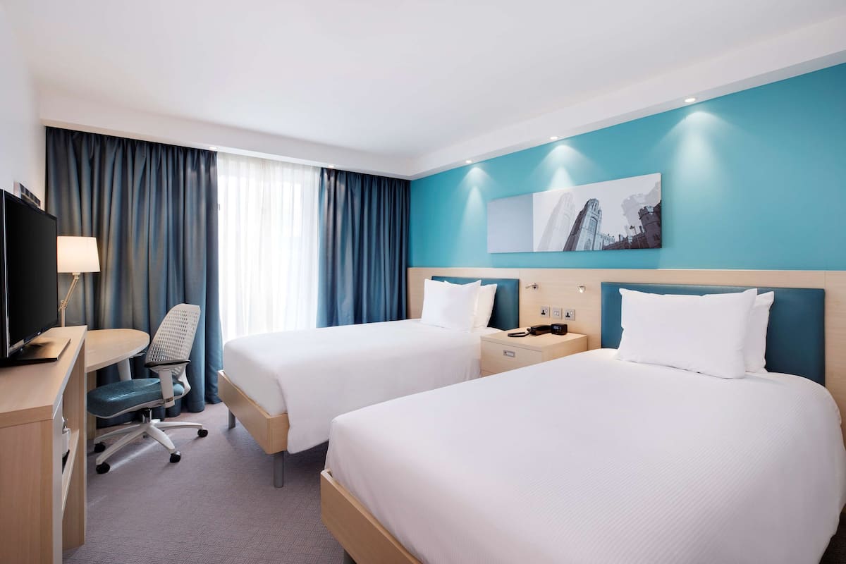 Hypo-allergenic bedding, in-room safe, desk, laptop workspace